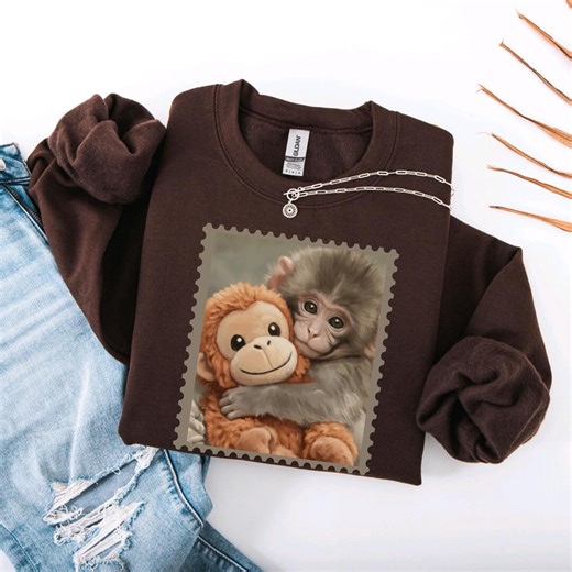Monkey Punch Graphic Sweatshirt, Baby Monkey Holding Plush Toy, Animal Lover Gift, Cute Cozy Hoodie - Etsy