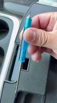 Open a center console on a Ram 1500 with a broken or stuck latch.