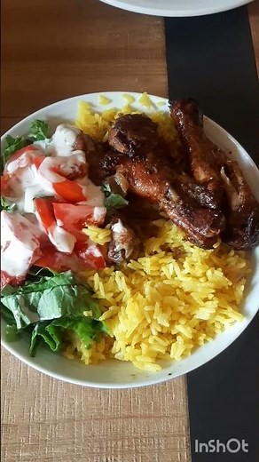 Crispy oven baked chicken legs and yellow rice