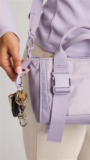 CALPAK on Instagram: "For when you want to keep it minimal, the new Fit Crossbody Gym Bag. Launching on 1/09 at 10am PT. #crossbodygymbag #gymessentials #whatsinmybagtoday"