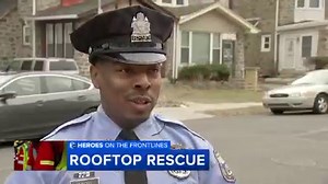 Philadelphia police officer sets aside fear of heights to rescue child from a roof