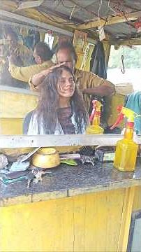Young Girl enjoy relaxing massage at Street Barber