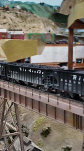 A trio of Rio Grande SD-45s (led by a tunnel motor, of course) crosses the Glen Frasier Viaduct high above Martinez. #modeltrains #trains #modelrailroad #modelrailroading #scalemodel #hoscale #hoscaletrains | Golden State Model Railroad Museum
