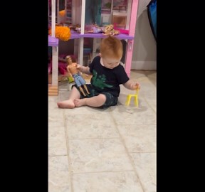 Little boy tries to sit on a Barbie chair and ends up falling adorably