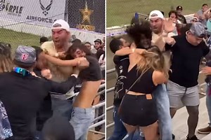 Wild brawl breaks out in stands at Speedway race as couple are kicked out