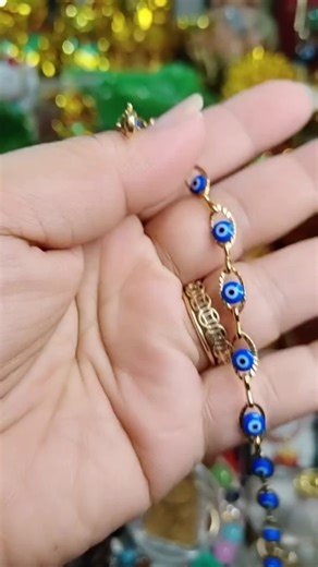 evil e ye protection charm bracelet with wallet charm