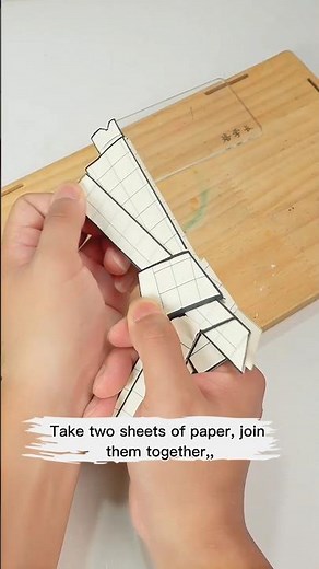Learn how to make a newly designed rubber band gun out of paper!#handmade #DIY #homemadetoys