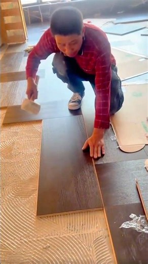 Installing Wood-Look Floor Tiles With Precision and Adhesive Mortar
