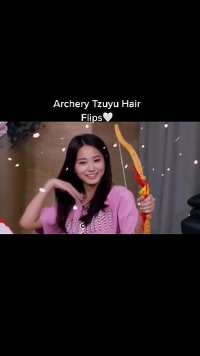 Archery Tzuyu Hair Flips: K-Pop's Graceful Star