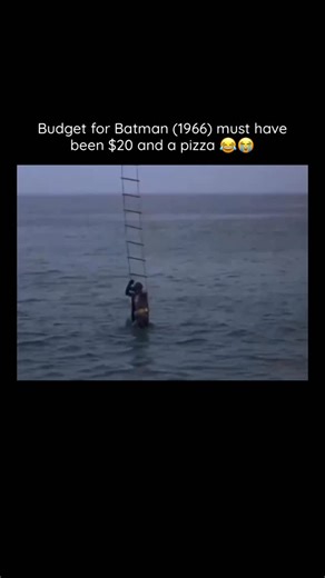 Daily Clip Breakdowns on Instagram: "The 1966 Batman was truly a masterpiece of unintentional comedy! 🦇 Only Adam West’s Batman would find himself dangling from a helicopter with a rubber shark attached to his leg, calmly asking for “Shark Repellent Bat Spray” like it’s a normal Tuesday. The funniest part is that Robin had to check the label because they apparently carry specific sprays for Barracudas, Whales, and Manta-Rays too!. And of course, the shark explodes when it hits the water because