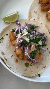 Did you know this?! The Secret to Bang Bang Shrimp Tacos is marinating your shrimp in buttermilk. Take your Taco Tuesday or Thursday, or any day, up a notch with crispy, tangy and spicy Bang Bang Shrimp Tacos! This Bonefish Grill Copycat Recipe is super easy to make and packed with so much flavor! This is such a fun and delicious and healthy High Protein recipes to make at home! Follow Chef Savvy for more high protein recipes! | Chef Savvy