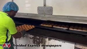 HOW THE BUNS ARE MADE The the Easter treat sold out at many bakeries on Holy Thursday. Hot cross buns are spiced sweet buns usually made with fruits and marked with a cross on the top. Hot cross buns are a staple on Good Friday and are a way to mark the end of the Lenten season. Bakers Devon Stanley and Putitia Mohammed of Attong’s Bakery in San Fernando showed Express chief Photographer Dexter Philip on Thursday how their buns are made. | Trinidad Express Newspapers