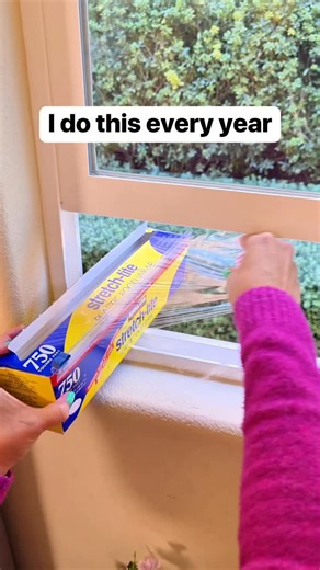 Liz Richards | Daily Original Vids on Instagram: "I help save money on my heating bills by adding cling wrap along my window seals during the cold months ❄️ #heating #wintertime #hometips #window"