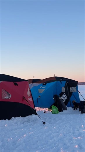 Middle of the lake with the moon and sun set at the same time