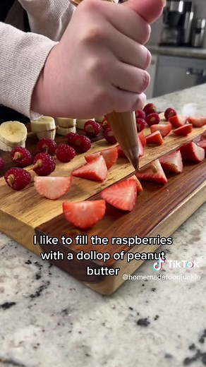 Chocolate covered frozen fruit bites 🍓 ✨INGREDIENTS✨ * 1 banana * 10 strawberries * 10 raspberries * 1/3 cups creamy peanut butter * 1/2 cup melted dark chocolate chips (60% or higher) Topping Ideas Chopped nuts Shredded coconut Course sea salt ✨INSTRUCTIONS✨ 1. Chop the banana and strawberries into slices 2. Place them on a cookie sheet lined with parchment paper (or silicone mat) and spread one half of the fruit with peanut butter 3. Make all of the fruit into little peanut butter sandwiches 
