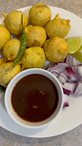 Batata Vada - બટાકા વડા For the Filling: *Boiled and mashed potatoes *Green chili-ginger paste *Garam masala *Sugar *Lemon juice *Salt to taste *Coriander powder (optional) *Chopped coriander leaves For the Batter: *1.5 cups gram flour (besan) *Salt to taste *½ teaspoon ajwain (carom seeds) *¼ teaspoon turmeric powder *A pinch of baking soda *Water (as required for a smooth batter) Method:- 🌸 In a bowl, mix the mashed potatoes with green chilli-ginger paste, garam masala, sugar, lemon juice, sa