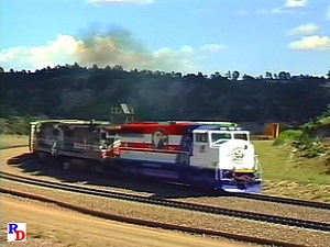 BN 1991, the Gulf War Troops Tribute engine leads two LMX engines with a mixed freight at Windy Point. From the Pentrex show "Burlington Northern's Crawford Hill" https://rfd.video/BNCH | Railfan Depot