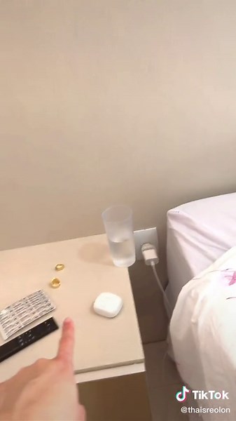 Exploring a Minimalist Bedroom with Cozy Ambiance