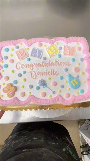 A surprise baby shower cake 🎀🍼 #CakeDecorating #babyshower | Messy Baker