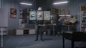 Modern workshop: Professional artisan or designer wearing VR headset assembles chair using extended reality and app with AI user interface. 3D graphics of holographic virtual furniture. VFX animation.