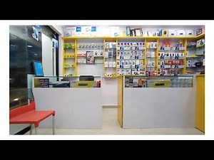 mobile shop interior design | Sree Hari Constructions