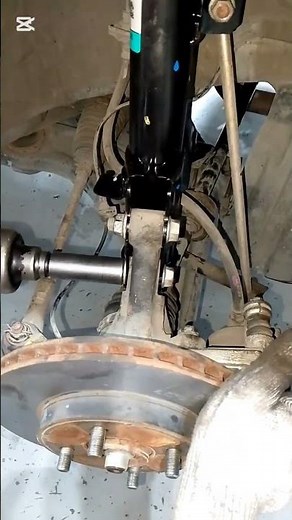 Nissan front Wheel shock absorber replacement