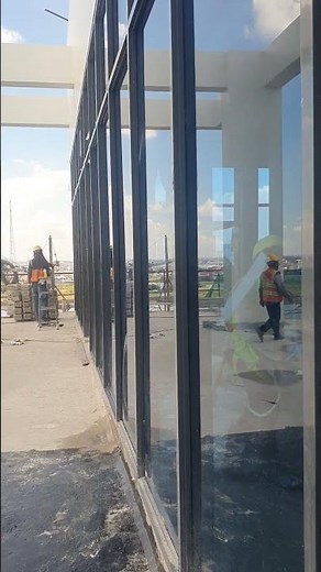 How Did They Build This Amazing Glass Wall?