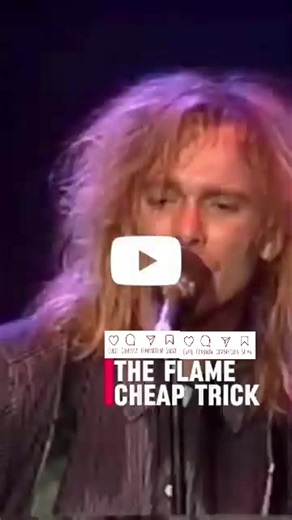 🔥❤️ “The Flame” — Cheap Trick ❤️🔥.#CheapTrick #TheFlame #Rock80s #PowerBallad #Classic80s Released in 1988, The Flame revealed a softer, more vulnerable side of Cheap Trick. Built as a power ballad with cinematic weight, the song turned longing and devotion into something intimate and expansive at once. Driven by a heartfelt vocal and a slow-burning arrangement, it became the band’s first and only number one hit in the United States. A moment where restraint replaced volume—and emotion carried