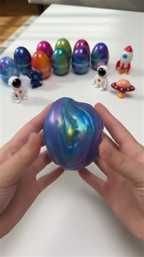 Unbox galactic joy with these amazing JOYIN Galaxy Slime Eggs! 🌟 Each of the 24 unscented, multi-color eggs comes with a fun surprise toy inside. Perfect for Easter baskets, space-themed parties, or as delightful party favors for kids aged 3 and up. Get ready for hours of creative, squishy fun! Tap to shop now. #galaxyslime #kidstoys #eastergifts #sensoryplay #AIGC #Moras