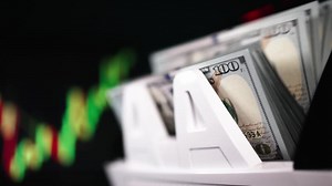 Download Electronic money counter machine counts American one hundred dollar banknotes. Financial control of cash income. Finance and banking concept. Financial figures and diagrams showing changing price. for free