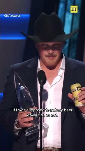 Zach Top Forgot to Put Down His Beer When Winning the CMA Award for New Artist of the Year.
