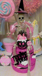 5.2K views · 157 reactions | Finishing the Pink Halloween Skelton macaron centerpiece decor from my live. Happy Pink-o-ween! #pinkhalloween #halloweendecor #halloweencenterpiece #halloweenwreath #halloweenfloral #halloweenfakebake #pinkoween | Glam Candy Boutique | Facebook