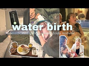 Unmedicated home birth in water with Midwife and Doula and family