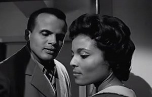 Happy 89th Birthday Harry Belafonte! Here he is with actress Kim Hamilton in a scene from the 1959 film which he also produced, "Odds Against Tomorrow." | Vintage Black Glamour