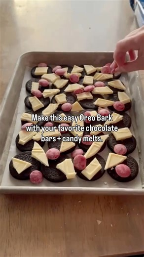 Full recipe for Valentine Oreo Bark 👇💕 Ingredients 24 Oreo Thins 1 (4 oz) white chocolate bar, broken into pieces 1 (4 oz) milk chocolate bar, broken into pieces 1/4 cup red candy melts Valentine sprinkles Valentine M&M’s Instructions 1. Preheat oven to 180°F. 2. Line a cookie sheet with a silicone baking mat or parchment paper. 3. Arrange the Oreo Thins in a single layer on the prepared pan. 4. Sprinkle the white and milk chocolate pieces evenly over the Oreos. 5. Place the pan in the oven fo