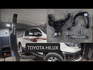 remplacement des bras supérieur et inférieur - biellette de direction ... toyota hilux