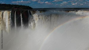 Iguazu Falls, Devil's Throat with rainbow, Garganta do Diabo, South America. Nature landscape of one of the Seven Natural Wonders of the World. Puerto Iguazu, Misiones, Arg