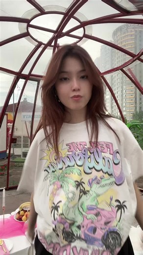 Colorful Dinosaur Graphic T-Shirt Fashion Showcase