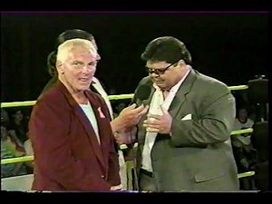 Bobby Heenan has a gift for Kenny Bolin