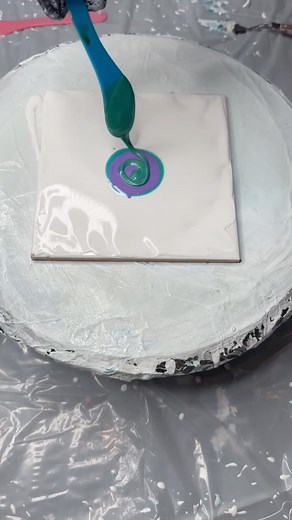 113 reactions · 40 comments | 6x6 tile using up some mixed up paints/pigments. Decided to try a little green with some purple. Interesting outcome! I gotta come back and look at this again to see if its a keeper ;-) . . . . . . . . . . . . . #fluidart #fluidartloop #fluidartshare #share #ericchurch #heartonfire #countrygirl #acrylicpourart #homedecor #abstractart #original #pigments #thankful #hightidecreations407 #positivevibes #arttherapy #instaart | High Tide Creations 407 | Facebook