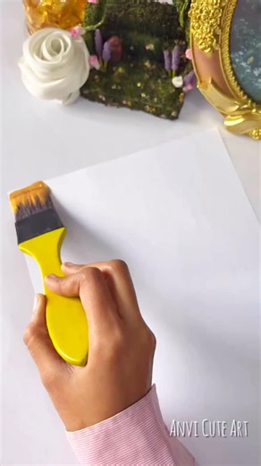 Crafted By Ayesha on Instagram: "Turning simple paper into a golden rose ✨ Handmade beauty that never fades 🌹 #diyrose #paperflower #handmadeart"