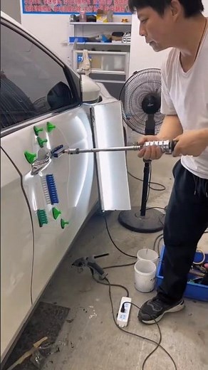 Fixing a car door dent 🚗