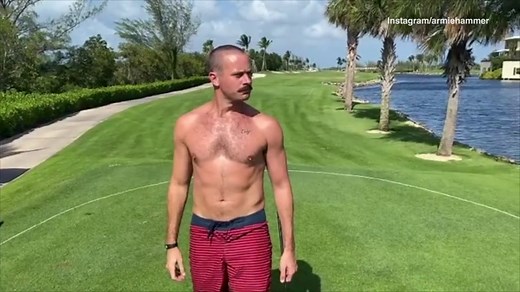 Armie Hammer goes shirtless while chugging beer and golfing
