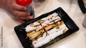 Preparing Rice Noodle Rolls in Hong Kong