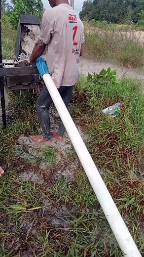 Manual Sand Sieving Process in Outdoor Setting