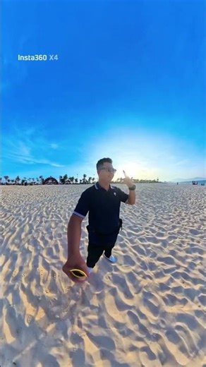 Filming a video enjoying the holiday at a vibrant beach party 🤩😍