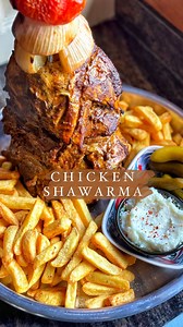 Did you know that if you take a paper towel holder, chicken & bunch of spices you can make an easy vertical chicken shawarma at home 😍 SOOO GOOD!! I made this a few years back & it was a hit with you guys so I decided to bring it back but with a better video! I’ll type up updated recipe shortly! What do you think ? #chickenshawarma #chickenshawarmarecipe #shawarmalove | mamaghanouj_kitchen