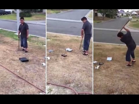 Father Makes Son Smash His Xbox consoles as pushiment for bad grades