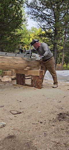 Scott Makes Flat Cut With Alaska Chainsaw Mill and Shows Results on Log Rafter