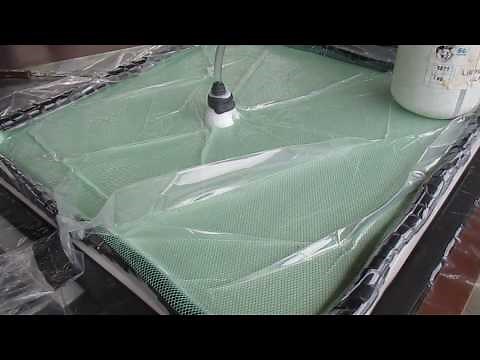 Vacuum application for resin transfer moulding process